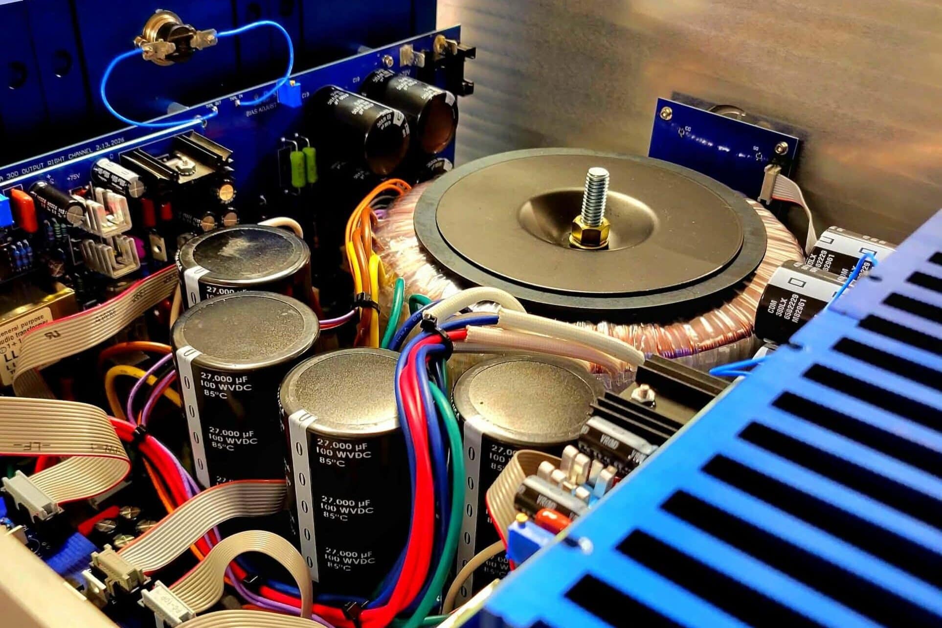 Internal construction of a ModWright amplifier illustrating the design decisions that contribute to the ModWright house sound.